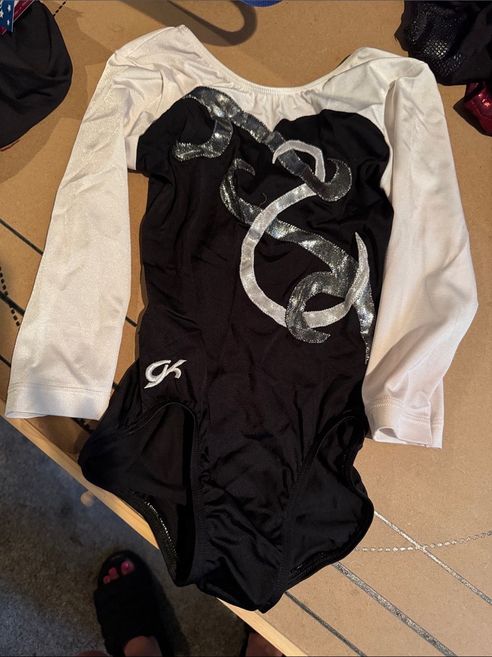GK Black and White Kids Long Sleeve Leotard with Silver Swirl